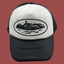 Cortiez Bold Black Oval Ship Logo Trucker Hat - White