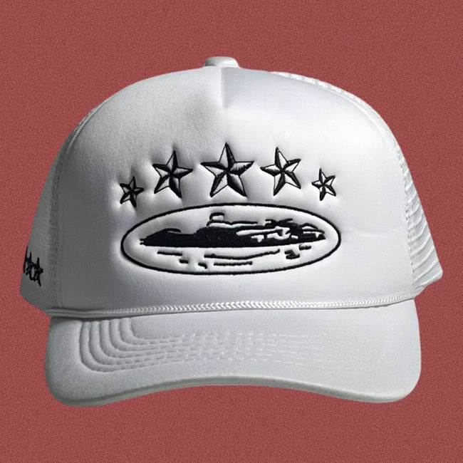 Corteiz Vintage White Trucker Hat with Black Stars and Cruise Ship Graphic Hover Image