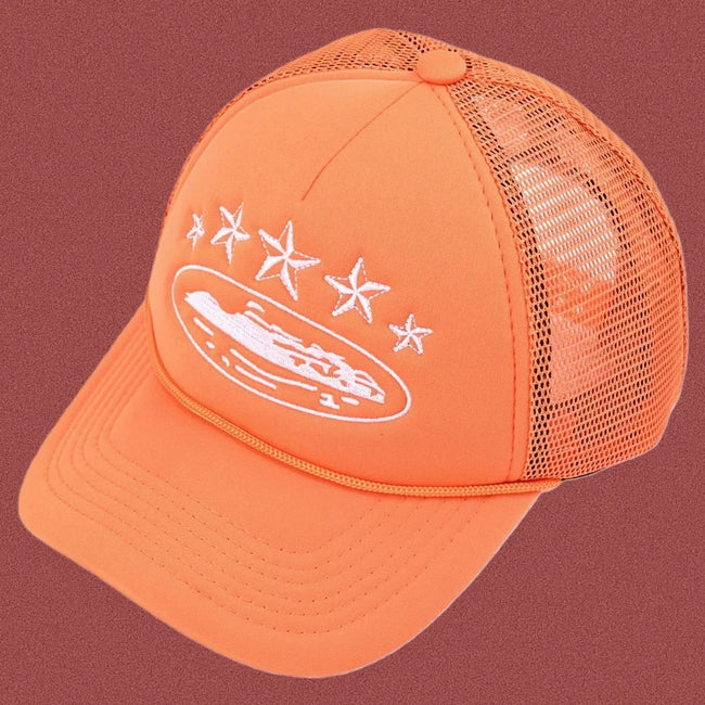 Corteiz Vintage Orange Trucker Hat with White Stars and Cruise Ship Graphic Hover Image