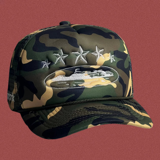 Corteiz Vintage Camo Trucker Hat with White Stars and Cruise Ship Graphic Hover Image