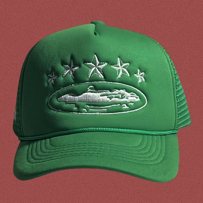Corteiz Vintage Green Trucker Hat with White Stars and Cruise Ship Graphic Hover Image